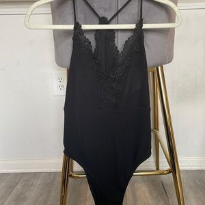 Top shop black bodysuit, size US 10